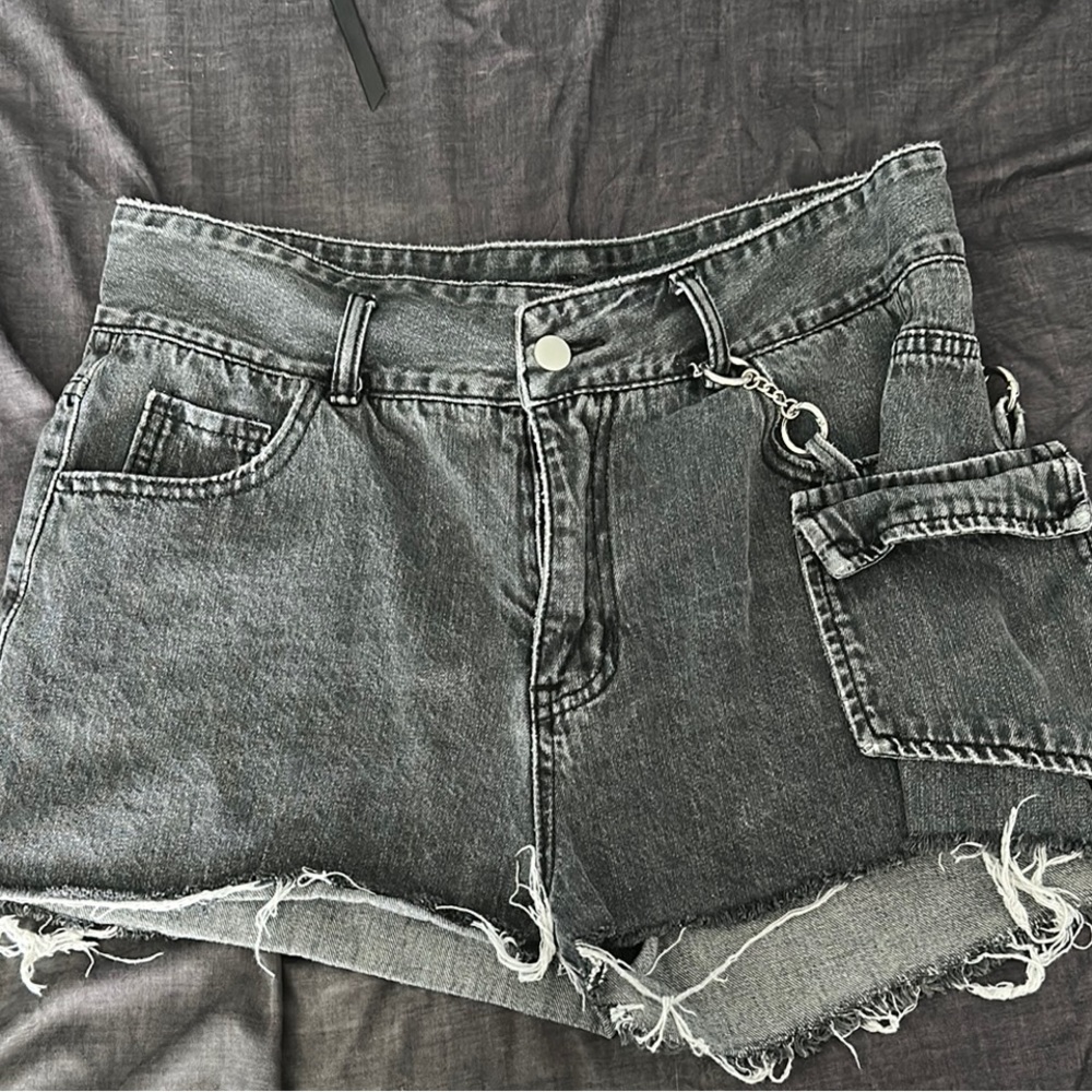Stylish Black Denim Women's Shorts with Chain Accent